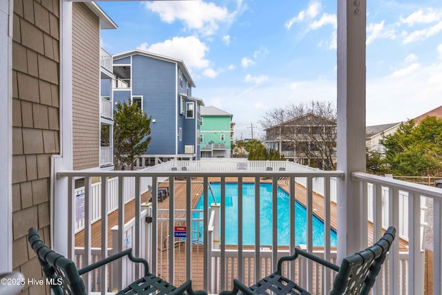 1503 Carolina Beach Ave N Unit 1D, Carolina Beach, NC 28428 - balcony featuring view of pool