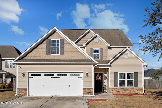 craftsman-style home featuring a garage