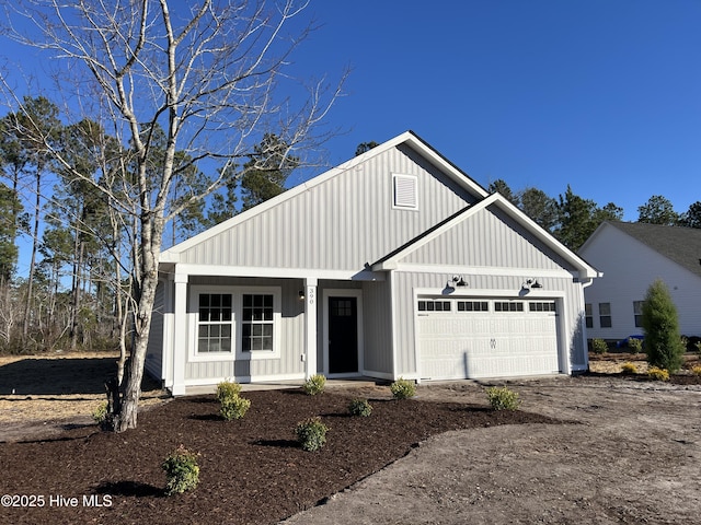 modern farmhouse featuring a garage