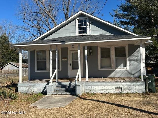 bungalow-style house featuring covered porch