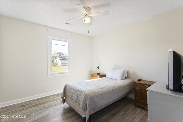 bedroom featuring a closet and light wood-type flooring