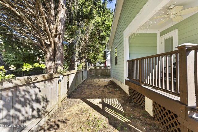 wooden deck with ceiling fan