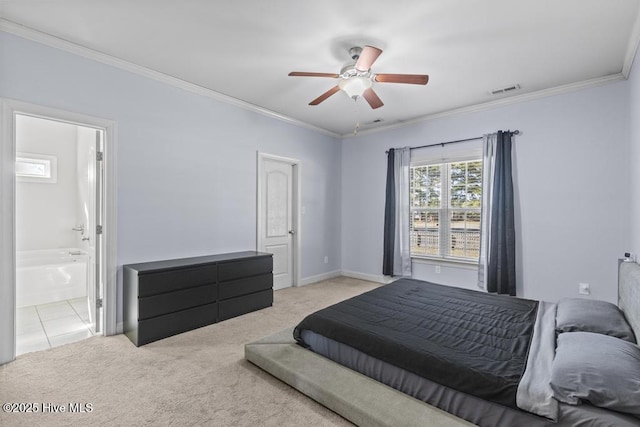 bedroom with ceiling fan, light colored carpet, ensuite bathroom, and crown molding