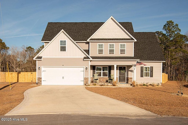 craftsman-style house with a garage and a porch