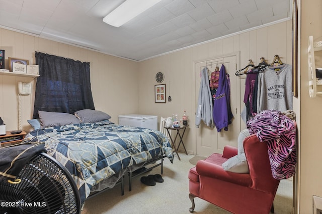 carpeted bedroom featuring ornamental molding