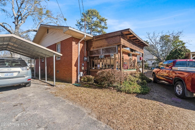 view of front of house with a carport