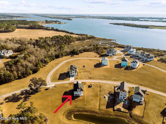 bird's eye view with a water view