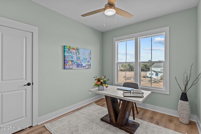 sitting room featuring lofted ceiling, light hardwood / wood-style flooring, and ceiling fan