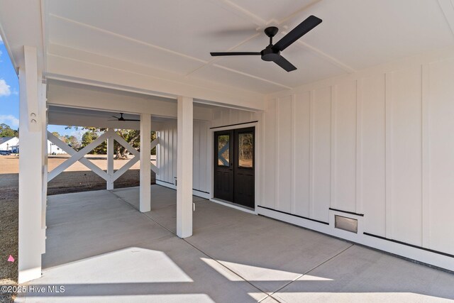 view of patio featuring ceiling fan