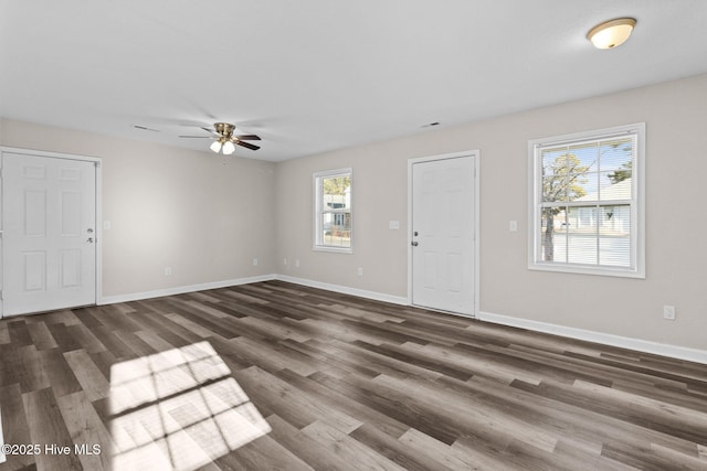 entrance foyer featuring ceiling fan and dark hardwood / wood-style floors