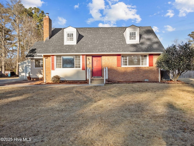 cape cod house featuring cooling unit and a front lawn