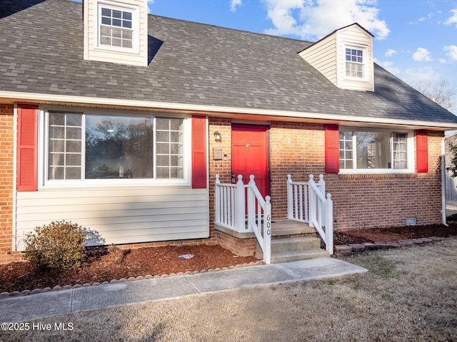 view of new england style home