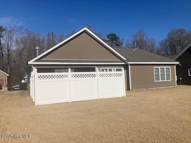 view of property exterior with a garage