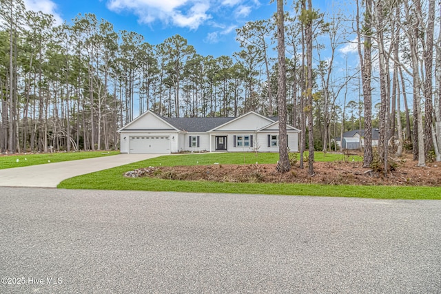 ranch-style home featuring a garage and a front lawn