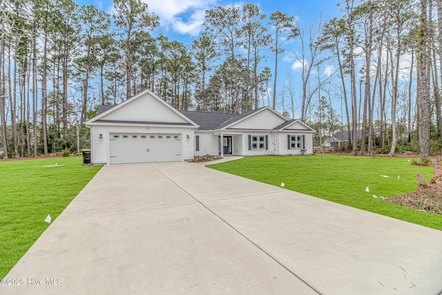 ranch-style home with a garage and a front lawn