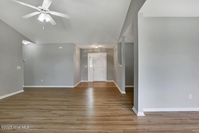 foyer with light wood-type flooring and ceiling fan