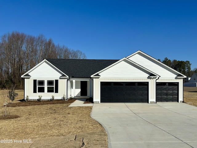 modern inspired farmhouse featuring a garage