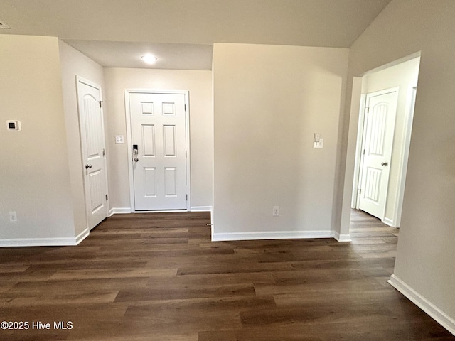 entrance foyer featuring dark hardwood / wood-style floors