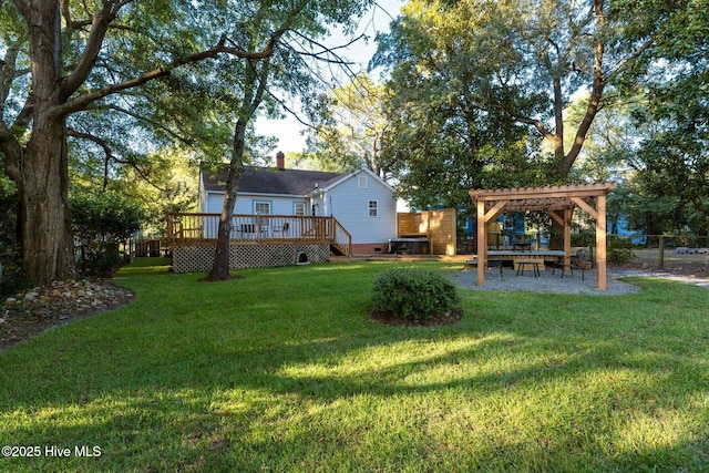 view of yard with a deck and a pergola