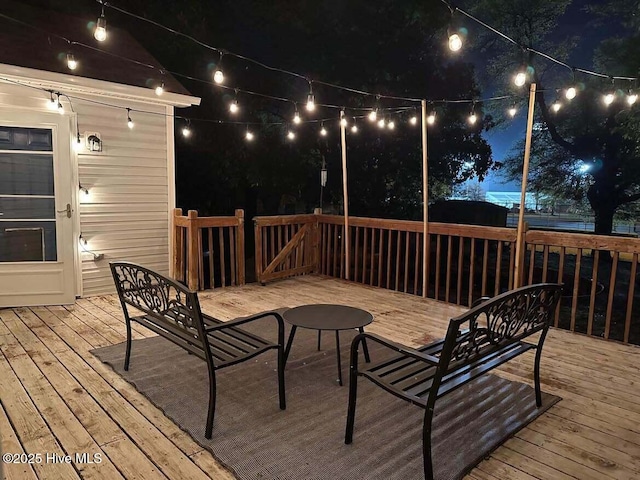 view of deck at night