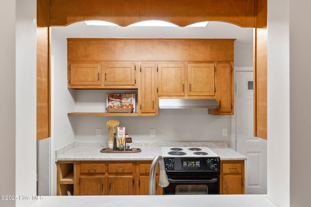 kitchen with black electric range