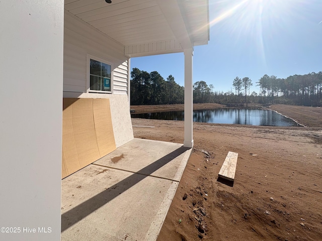 view of patio / terrace featuring a water view