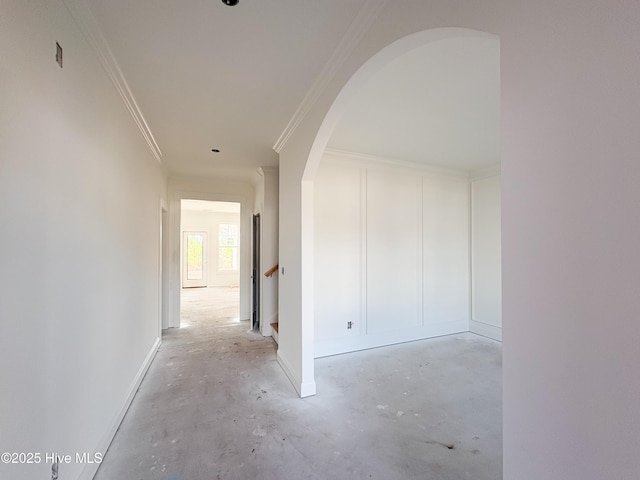 corridor featuring crown molding