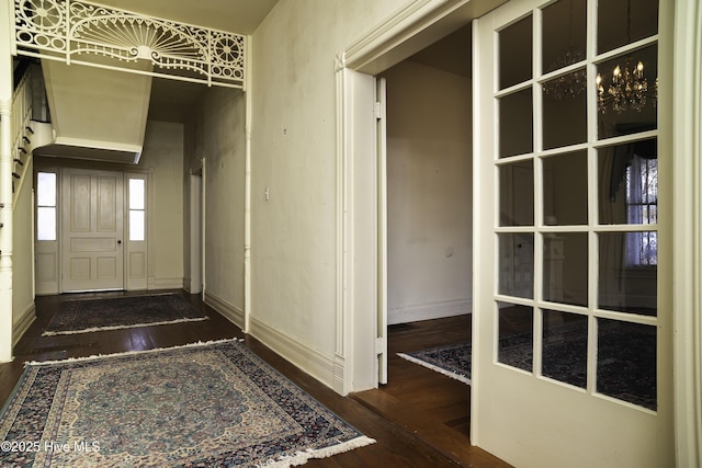 corridor with dark hardwood / wood-style floors