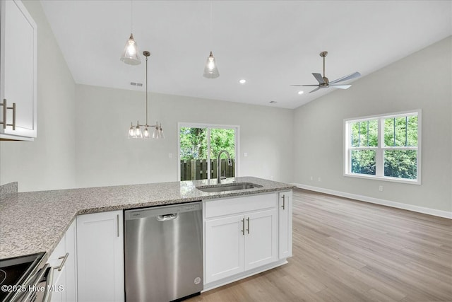 211 Lincoln Place Cir, Leland, NC 28451 - kitchen featuring stainless steel appliances, a sink, a ceiling fan, white cabinets, and light stone counters
