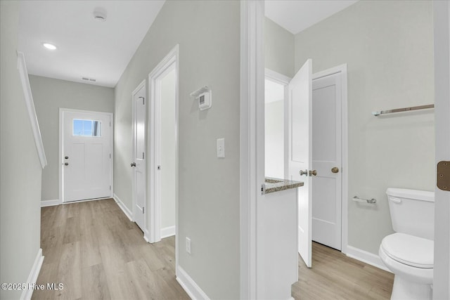 211 Lincoln Place Cir, Leland, NC 28451 - hall with light wood-style floors and baseboards