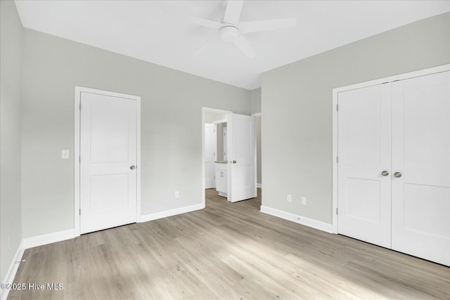 211 Lincoln Place Cir, Leland, NC 28451 - unfurnished bedroom featuring light wood-style flooring, baseboards, a closet, and a ceiling fan