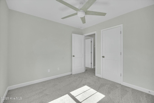 211 Lincoln Place Cir, Leland, NC 28451 - unfurnished bedroom featuring carpet floors, baseboards, and ceiling fan