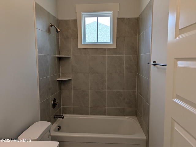 full bathroom featuring tub / shower combination and toilet