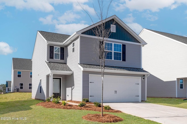 view of front facade featuring a garage and a front yard