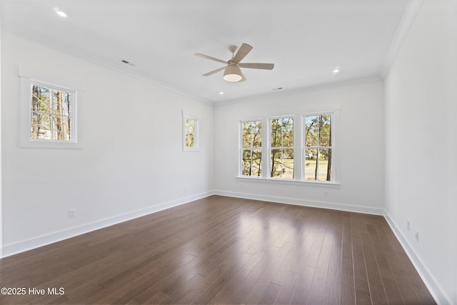 spare room with ceiling fan, dark hardwood / wood-style floors, and ornamental molding