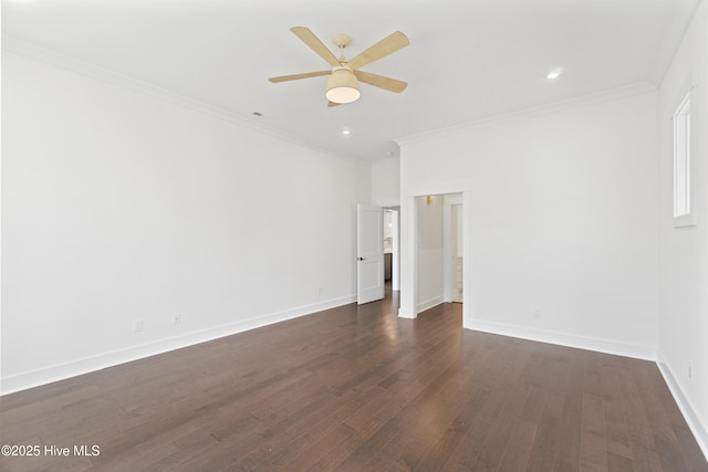 empty room with ceiling fan, dark hardwood / wood-style floors, and ornamental molding