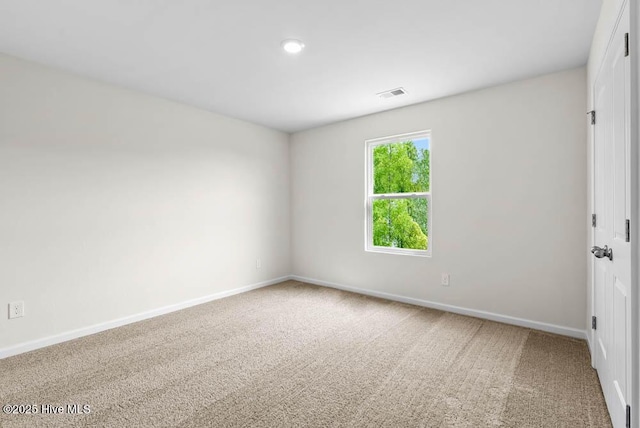 view of carpeted spare room