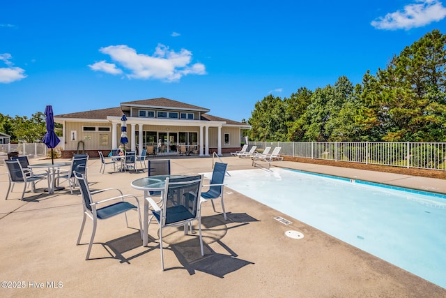 view of pool featuring a patio