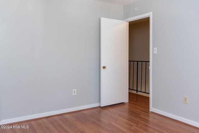 empty room featuring hardwood / wood-style floors