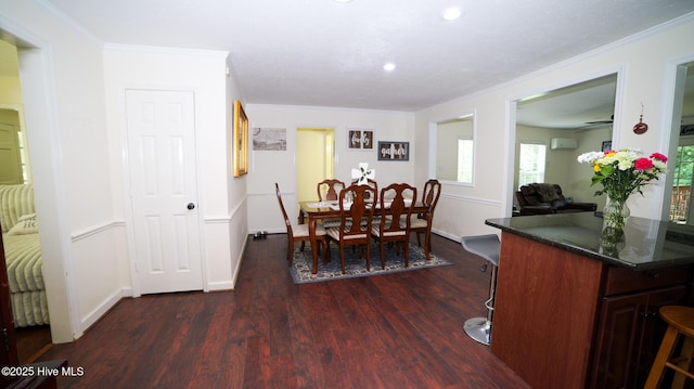 dining area featuring ceiling fan, dark hardwood / wood-style flooring, and ornamental molding