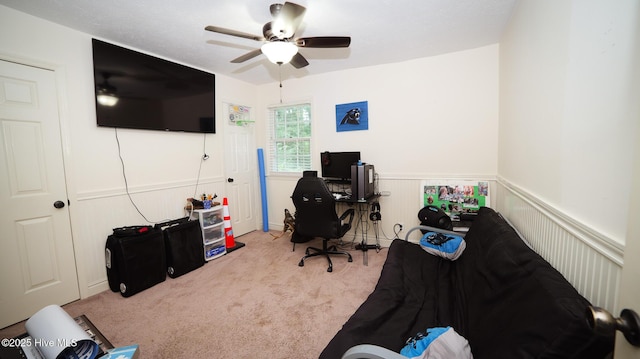 home office featuring ceiling fan and carpet flooring