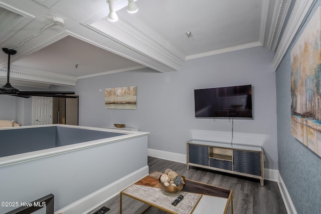 living room with dark wood-type flooring and ornamental molding