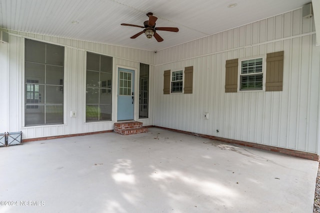 view of patio featuring ceiling fan