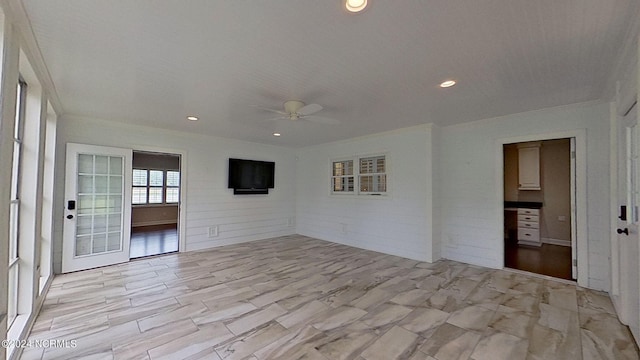 spare room with ceiling fan