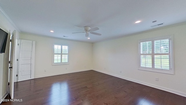 unfurnished room with ceiling fan, dark hardwood / wood-style floors, crown molding, and a healthy amount of sunlight