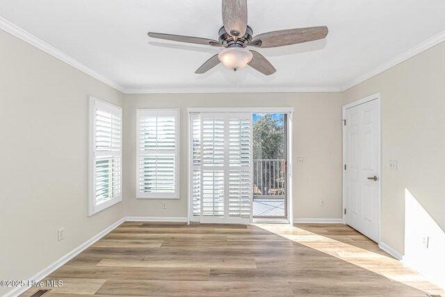 unfurnished bedroom with ceiling fan, light hardwood / wood-style flooring, connected bathroom, ornamental molding, and a walk in closet