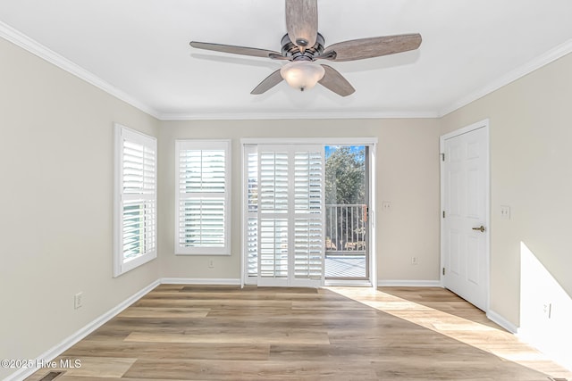 spare room with ceiling fan, light hardwood / wood-style flooring, and ornamental molding