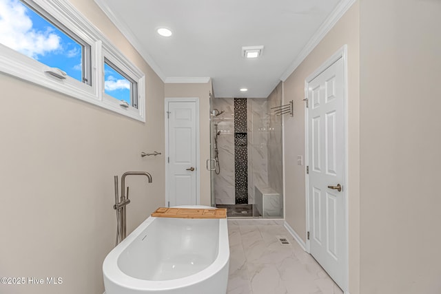 bathroom with separate shower and tub and ornamental molding