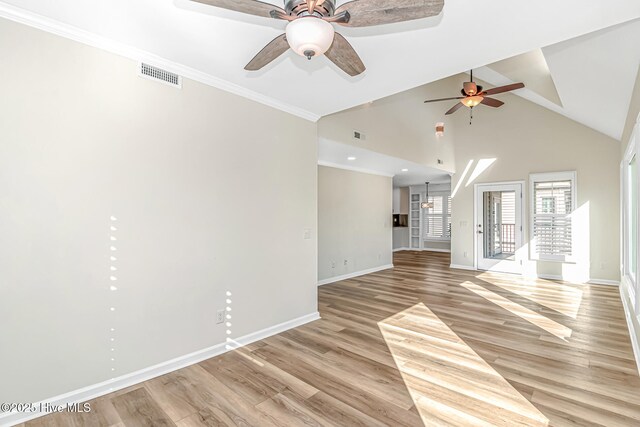 unfurnished living room featuring light wood-type flooring, ceiling fan, and high vaulted ceiling