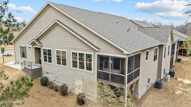 back of property featuring cooling unit and a sunroom